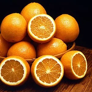 Sweet oranges, whole and halved