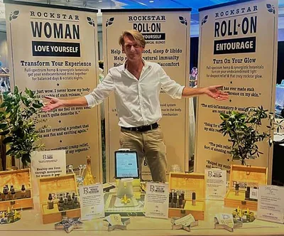 John branding at the booth.