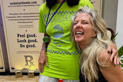 Heather with repeat client and Rockstar evangleist at the Rockstar Blends booth | Cannadelic 2024