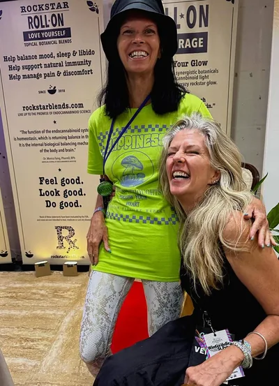 Heather with repeat client and Rockstar evangleist at the Rockstar Blends booth | Cannadelic 2024
