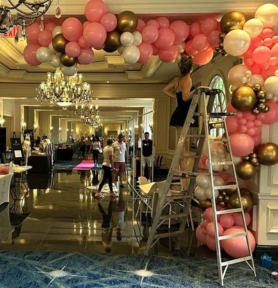 SRQ Women's Expo team creating the grand entrance at the Ritz-Carlton